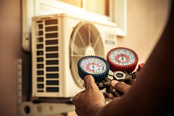 Professional Hvac technician working in Birmingham, MI